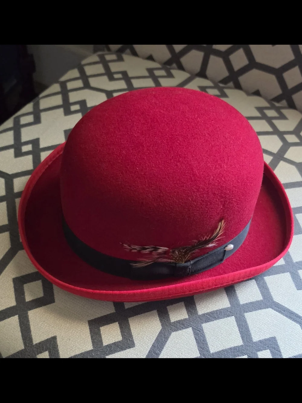 Men's Red Wool Bowler Hat with Black Band and Feather Accent